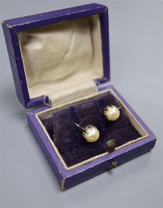 A pair of yellow metal and cultured pearl ear clips, pearl diameter 7.4mm.